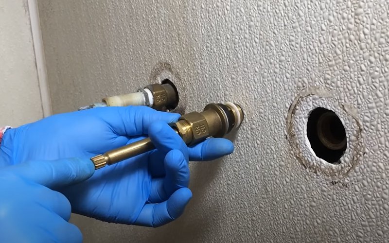 insert new cartridge for shower faucet repair