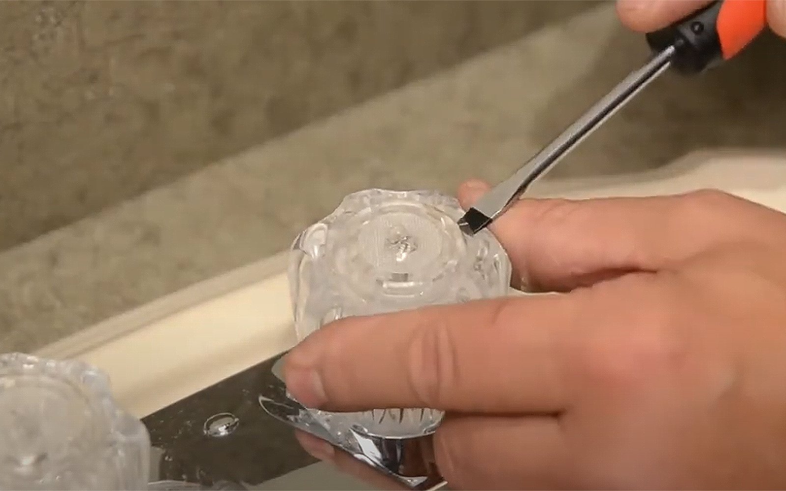 Remove the Decorative Cap-one step of Remove a Faucet Handle