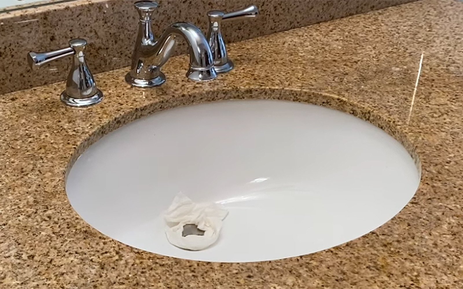 Protect the Area—remove a faucet handle